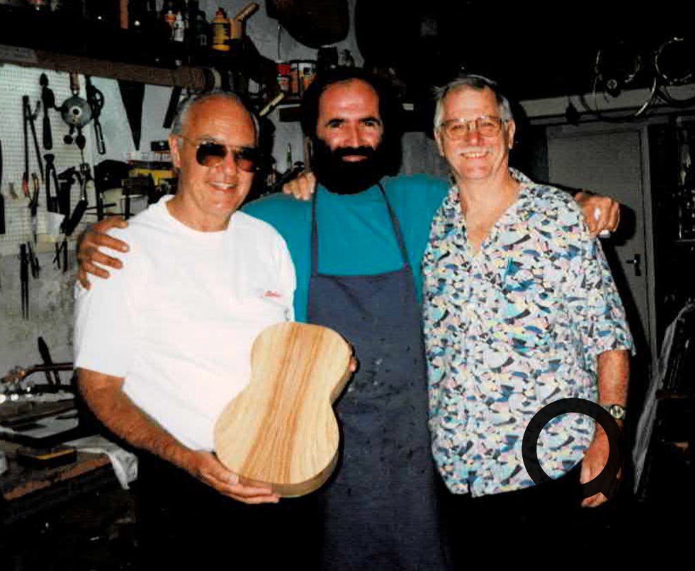 Instrument maker Carlos Jorge Rodrigues with Leslie Nunes and Dan Scanlan in Carlos' shop.